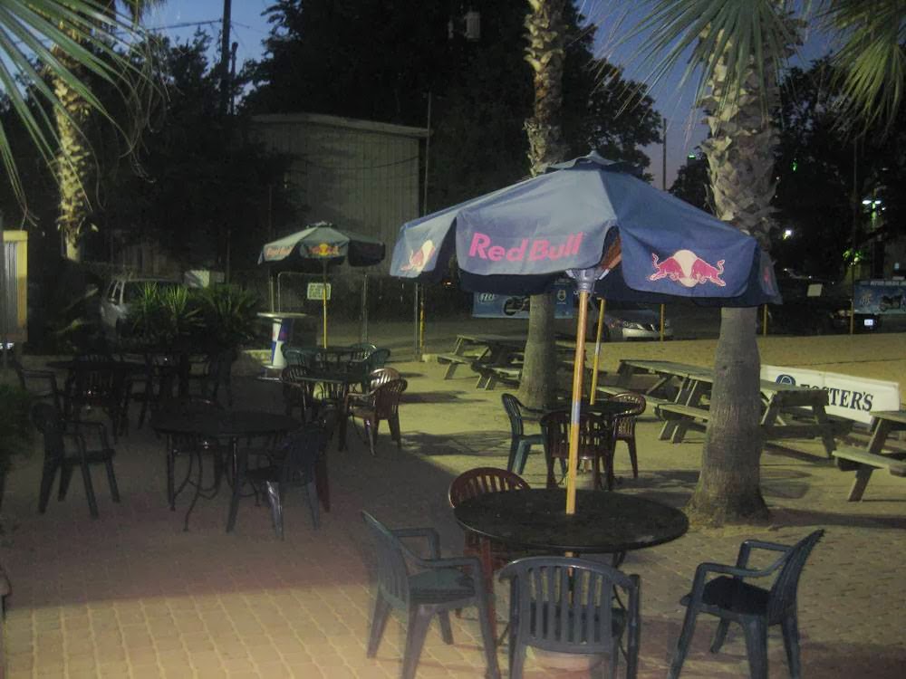 Aussie's Grill and Beach Bar patio with sports screens, Barton Springs Austin