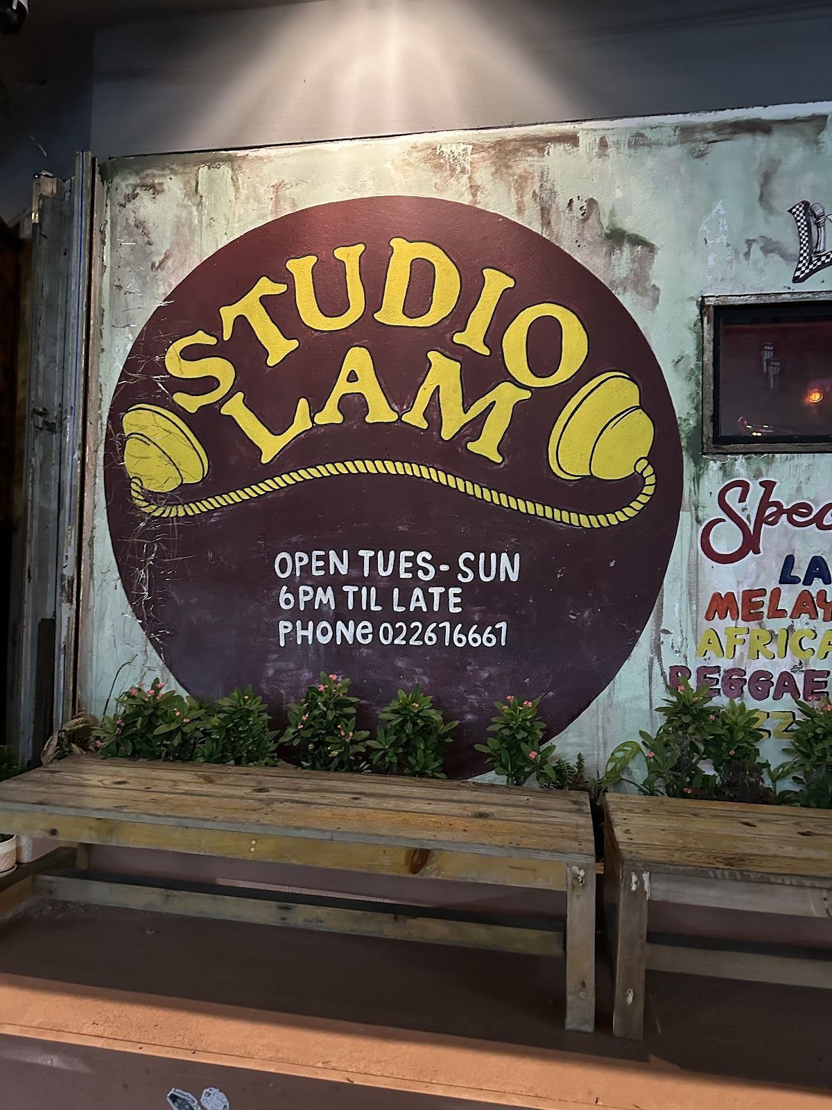 Studio Lam vinyl bar interior, warm mood lighting, Phrom Phong Bangkok