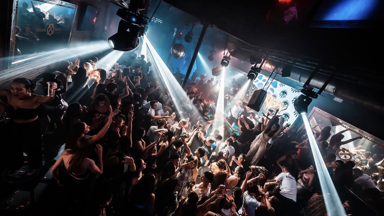 A dark, multi-level music club with stage lighting at Otto Zutz, Barcelona