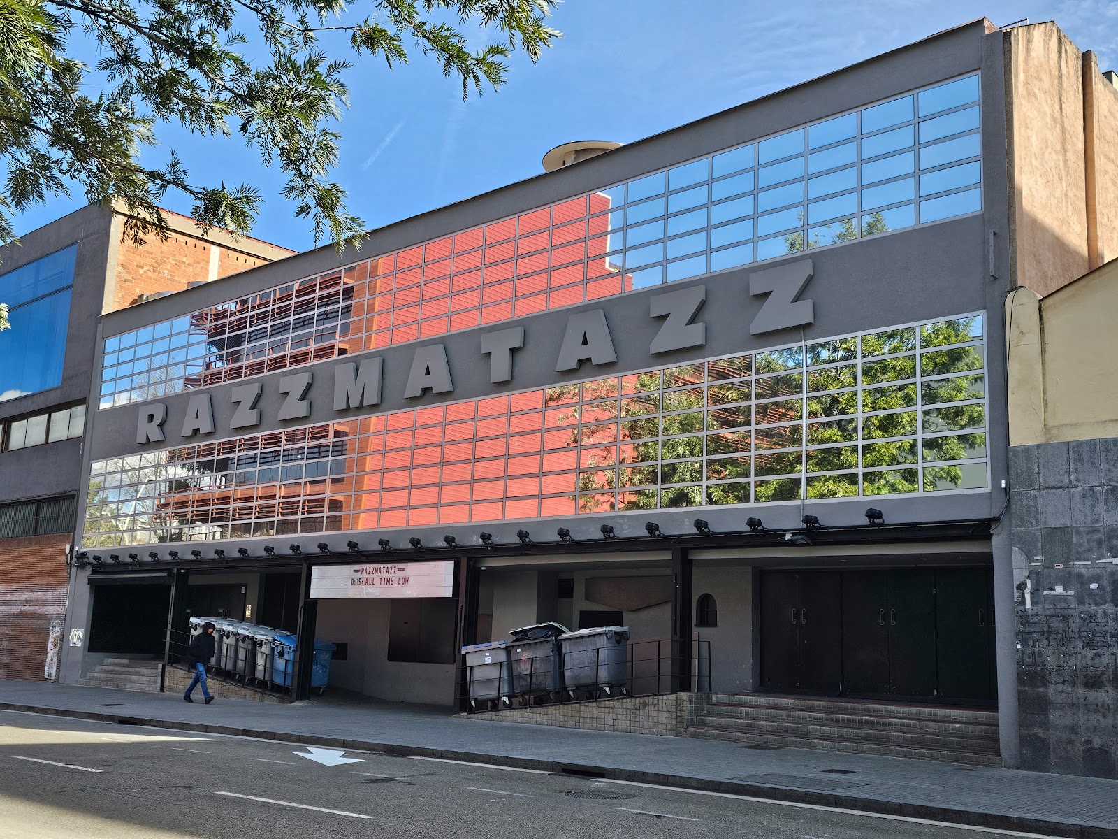 Crowd and stage lights inside a large Barcelona club like Razzmatazz