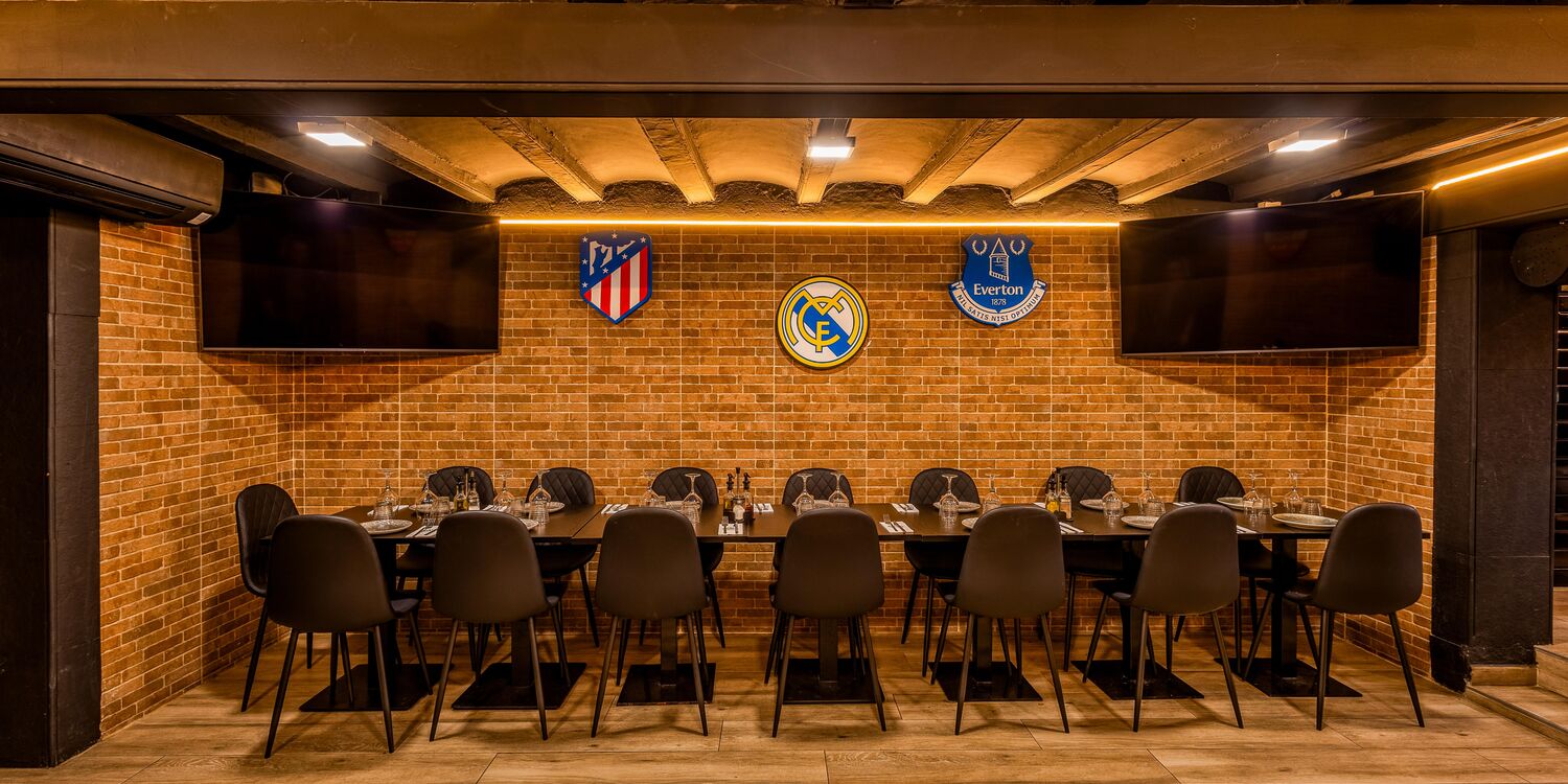 Sports Bar BCN with banks of screens on La Rambla, Barcelona