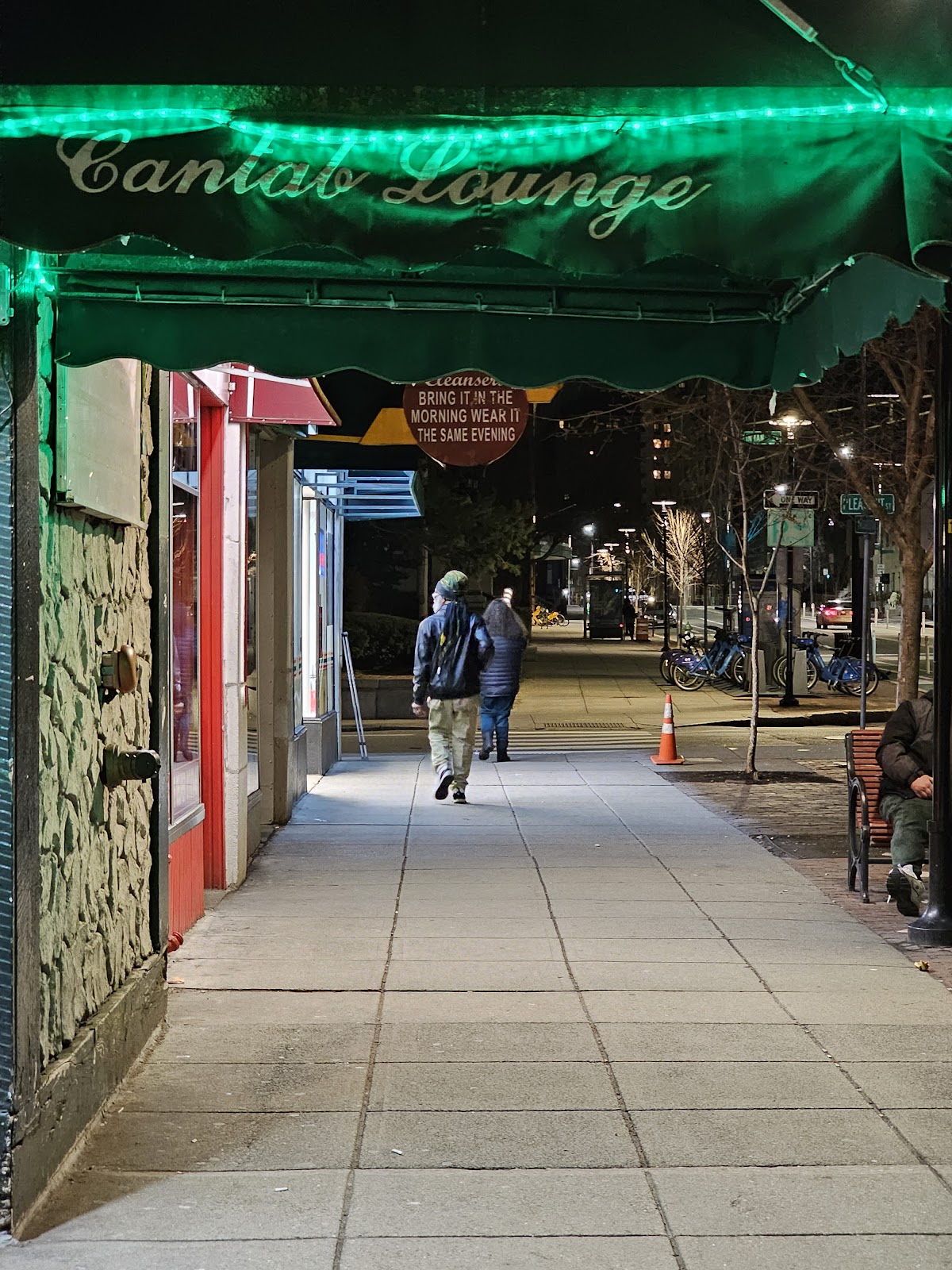 A dim neighbourhood music bar with a small stage in Cambridge