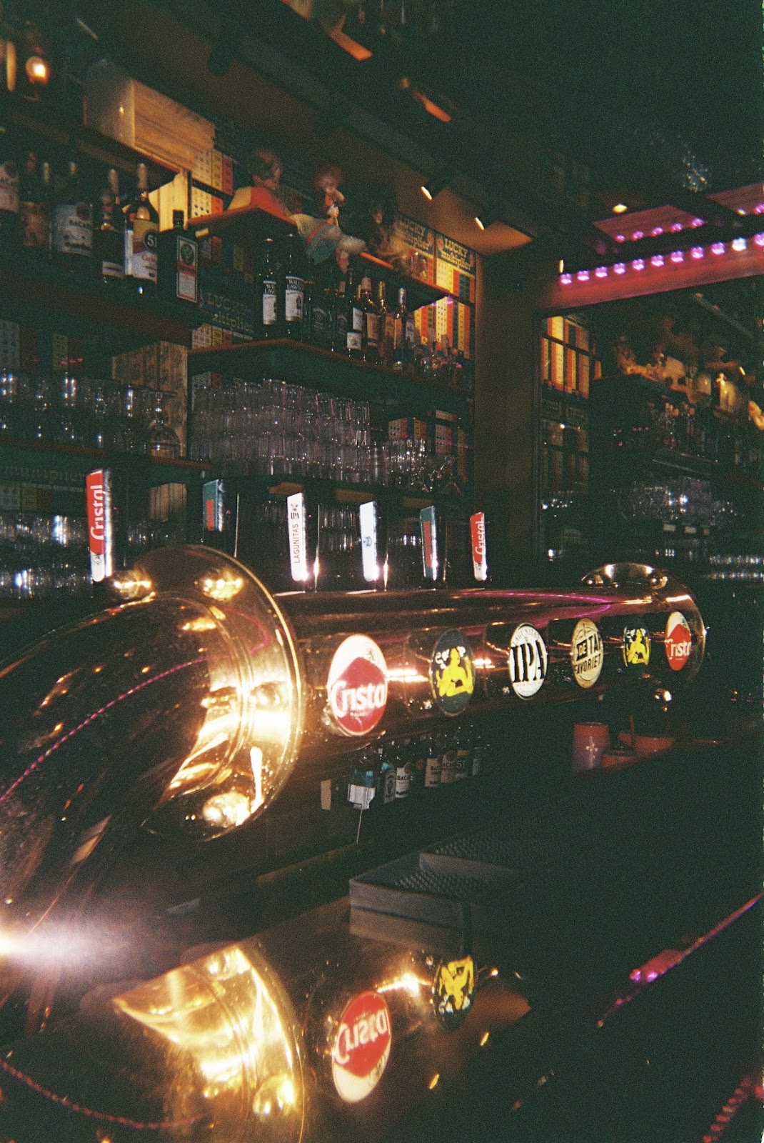 Low lit dance floor and stage at a cabaret bar like Madame Moustache in central Brussels