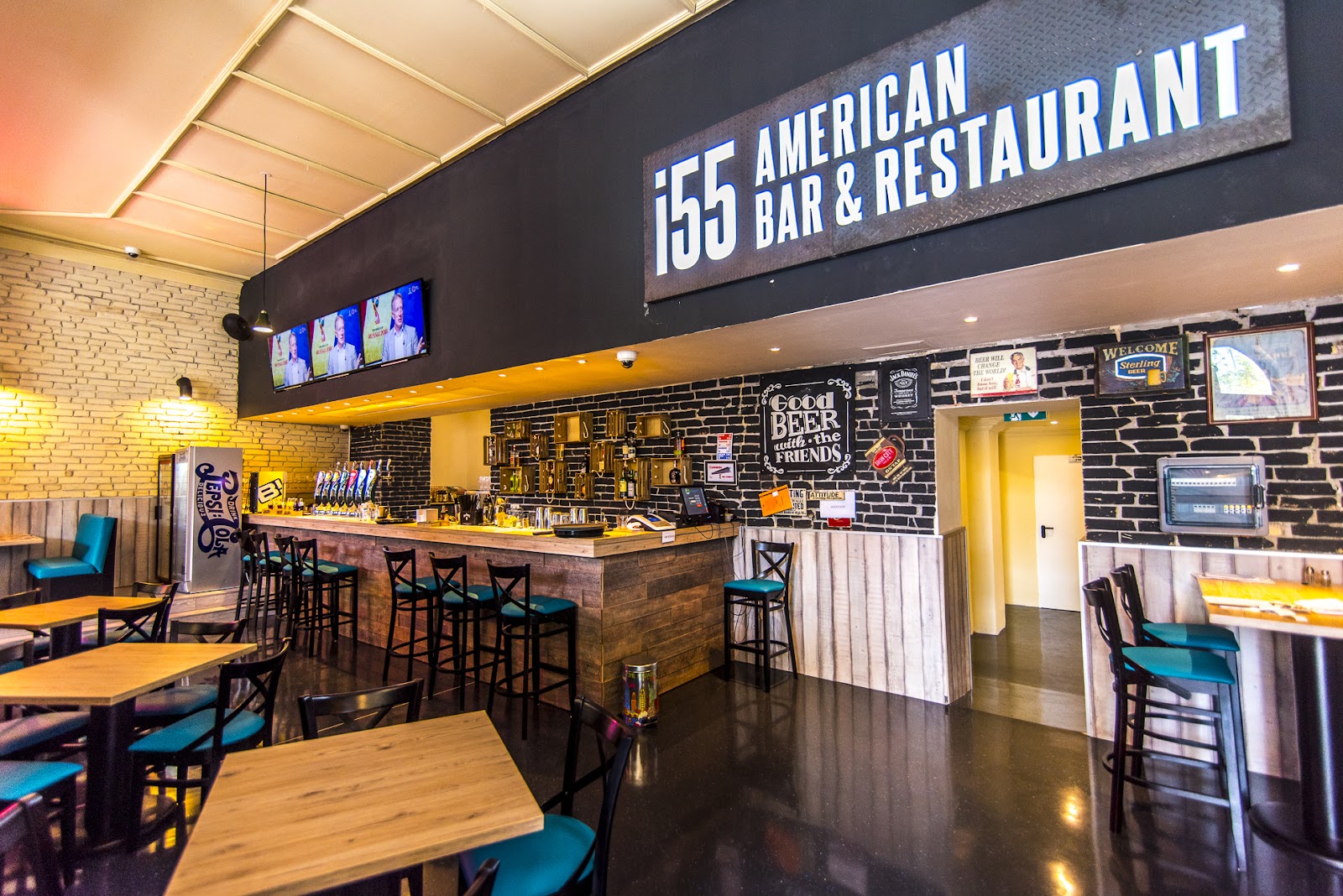 i55 American Bar interior with screens and memorabilia, Alkotmany utca, Budapest