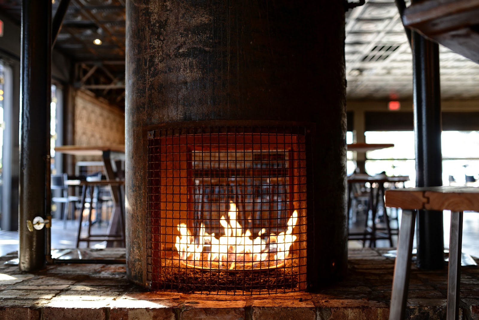 Henry's Majestic bar interior with reclaimed wood and a patio in West Dallas