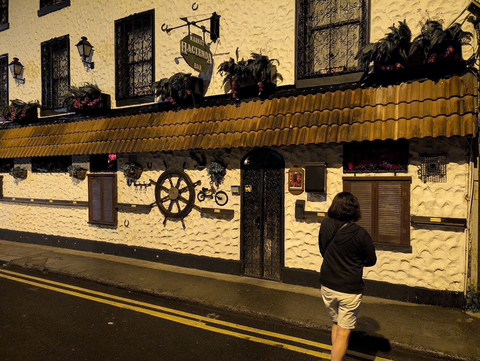 Dim, guarded-door pub interior evoking Hacienda Bar on Little Mary Street, Dublin