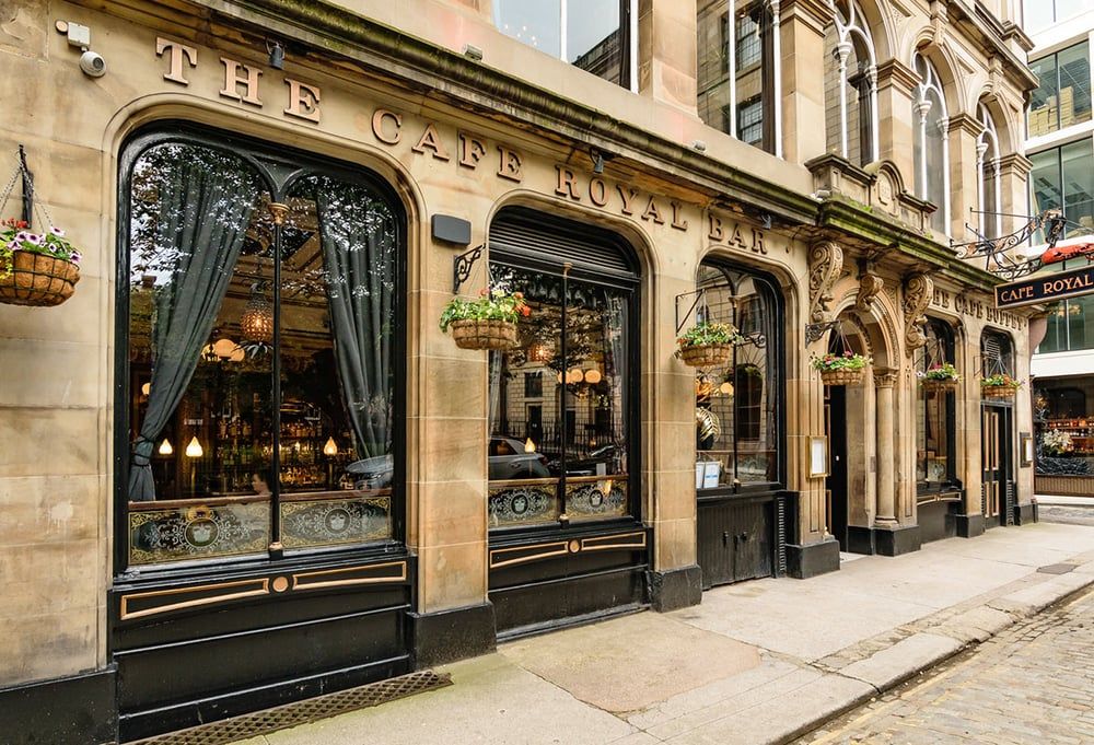 Victorian bar with etched mirrors, tiled walls and a spirit-cask gantry, Edinburgh Tollcross