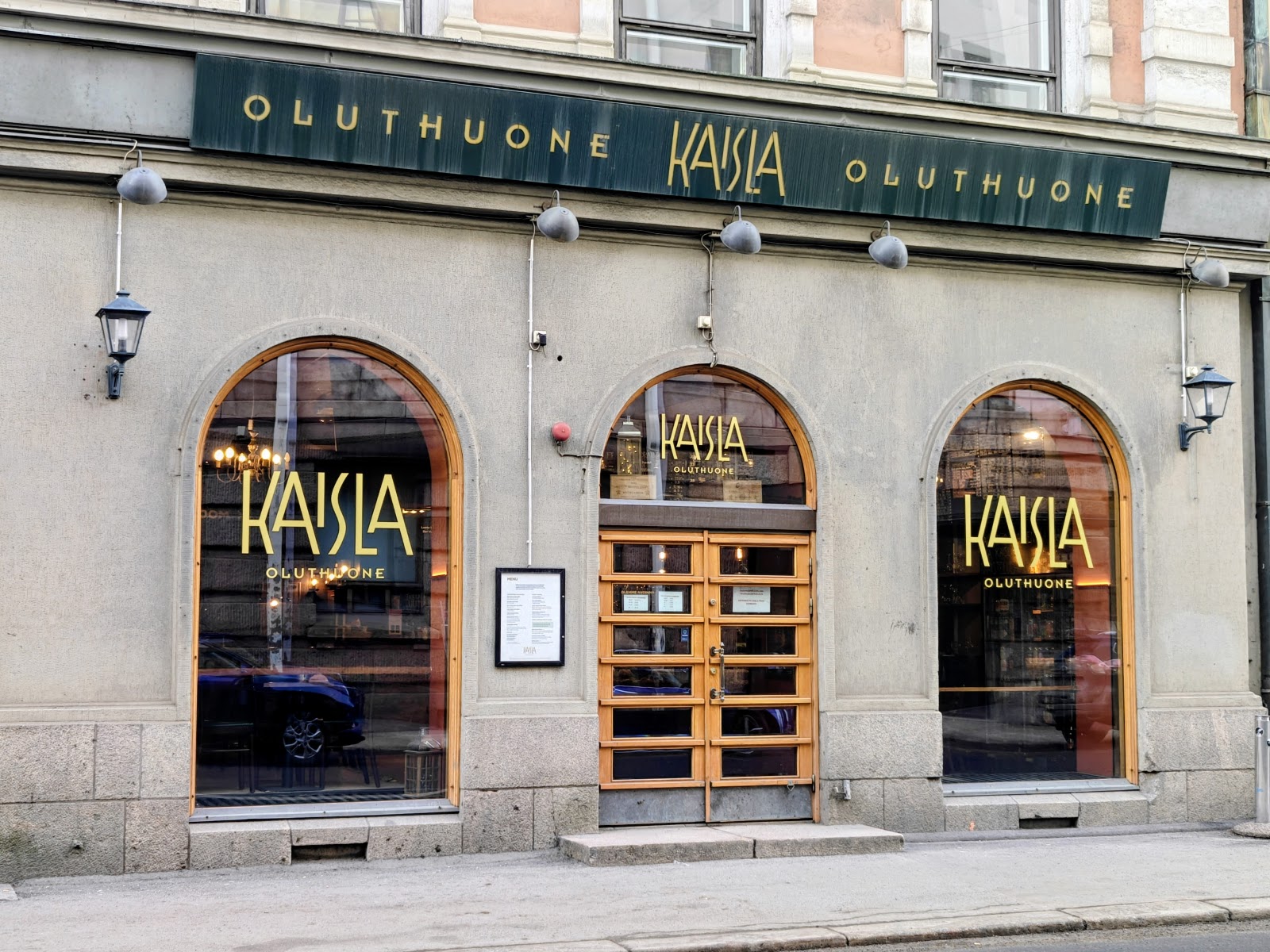 Classic wood lined pub interior, similar in mood to Oluthuone Kaisla in Helsinki
