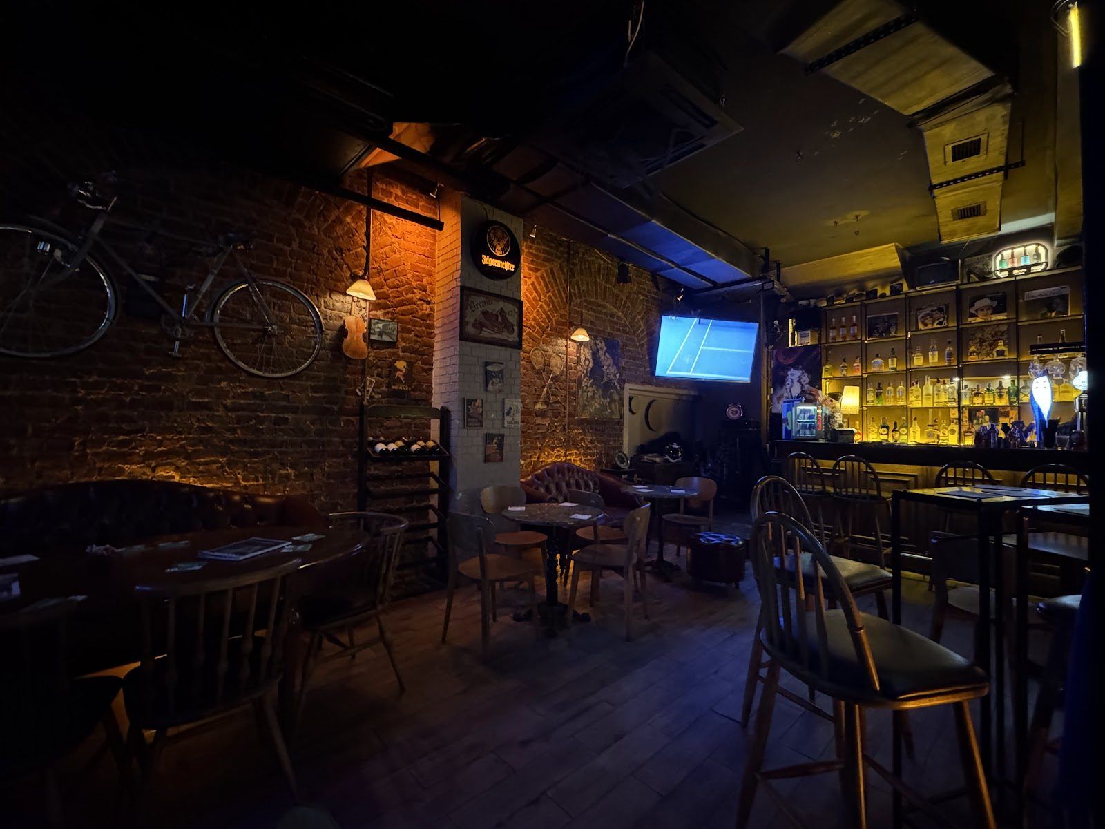 Intimate candlelit cocktail bar interior, Istanbul