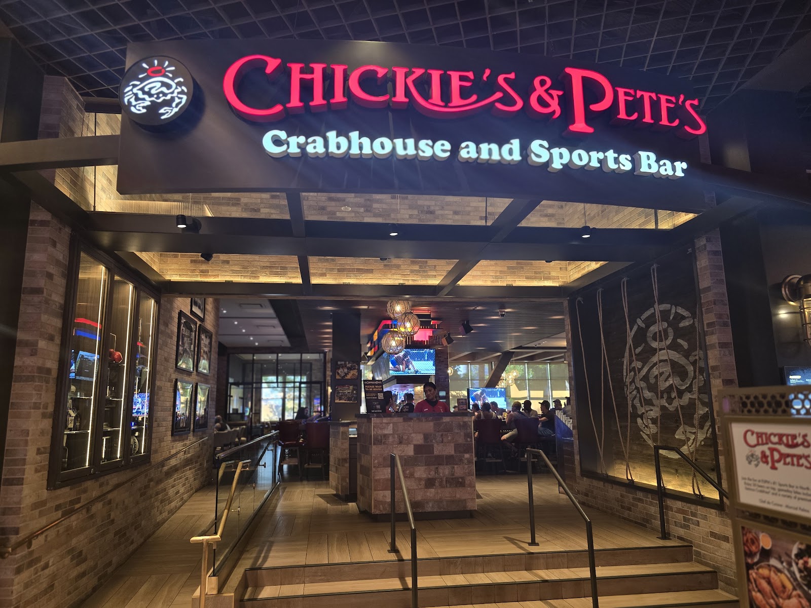 Chickie's and Pete's sports bar interior with screens at SAHARA Las Vegas
