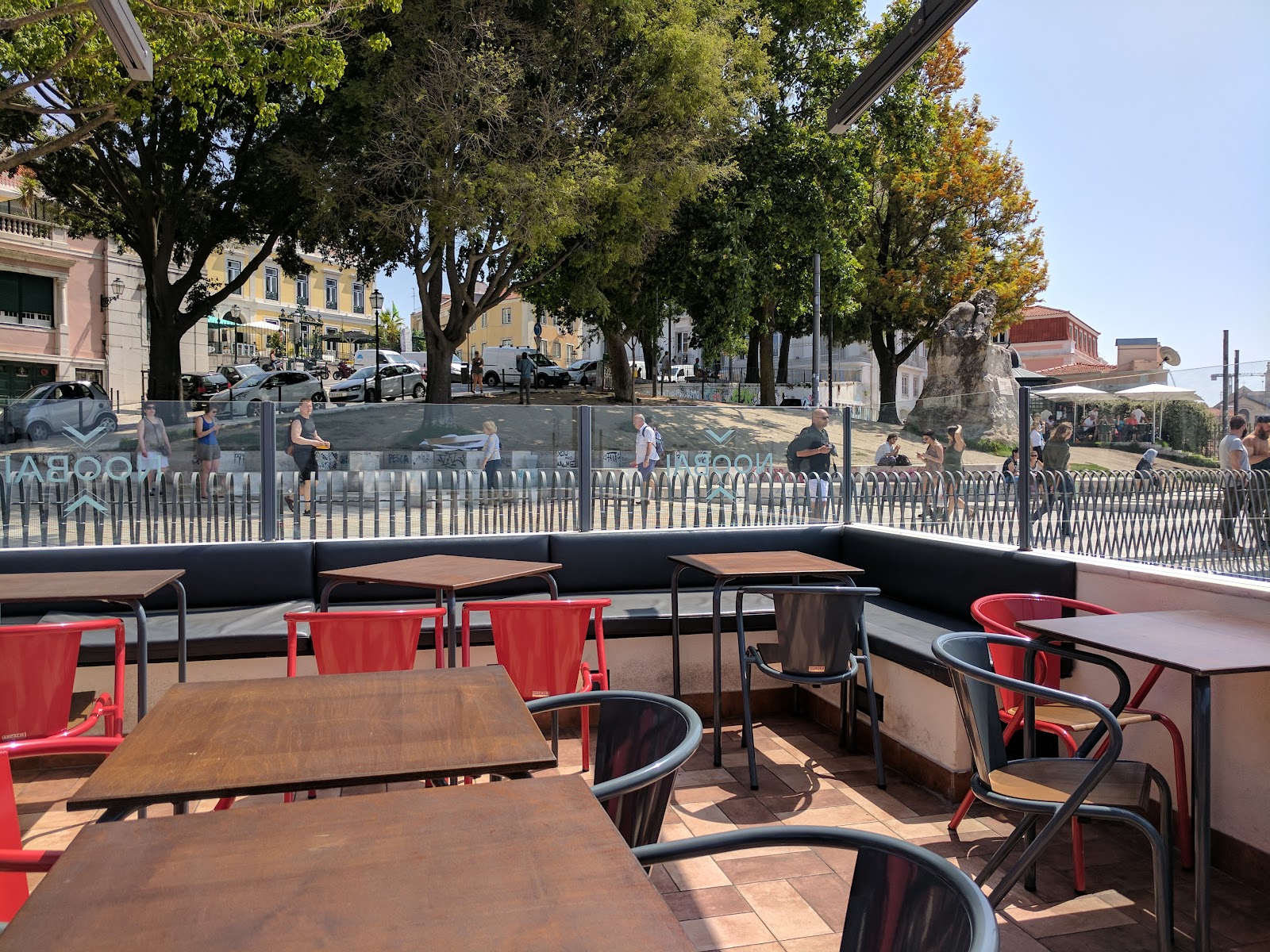 Open terrace bar with wide river views below the Santa Catarina viewpoint in Lisbon