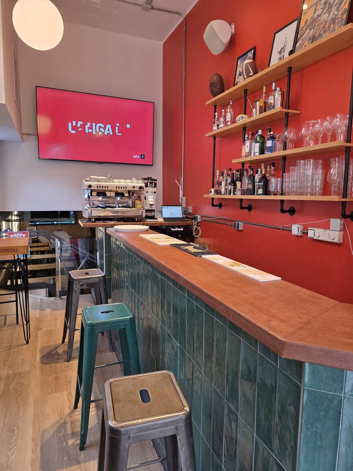 S10BAR interior with screens in Chamberi, Madrid