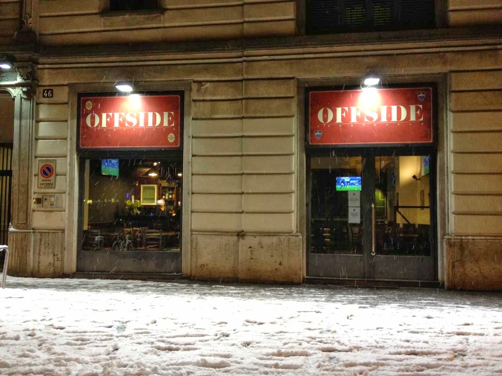 Sport bistrot interior with independent screens on Piazza Piemonte, Milan