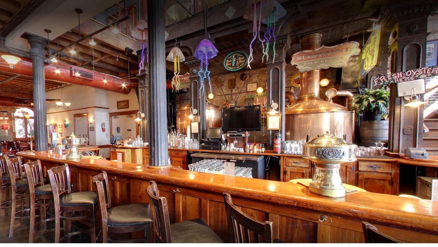 French Quarter brewery bar with house lagers and a balcony in New Orleans