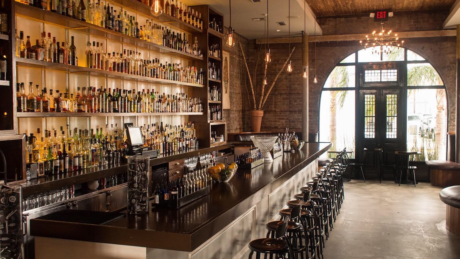 Cure cocktail bar interior, New Orleans — craft cocktails on Freret Street