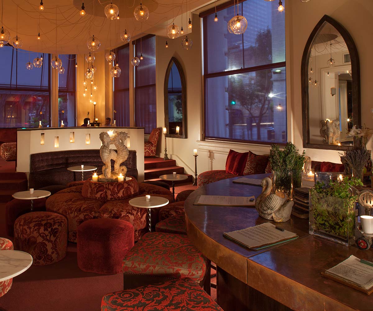 Candlelit hotel cocktail bar with amber lighting in New Orleans