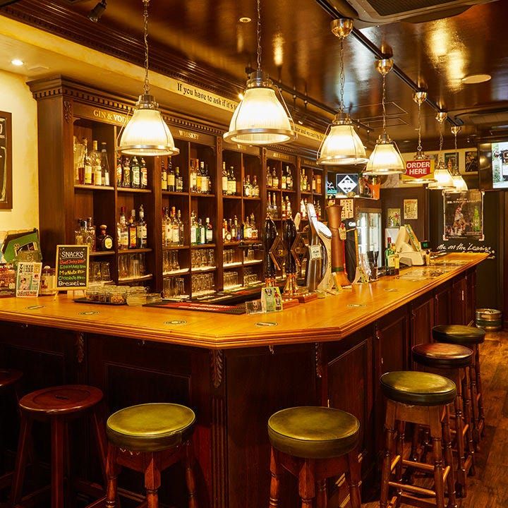 Rugby-themed bar with memorabilia and a screen, Fukushima ward, Osaka