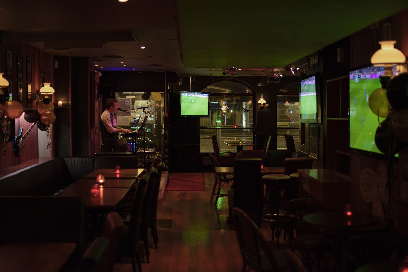Eagle Pub interior with screens and a bar in Grønland, Oslo