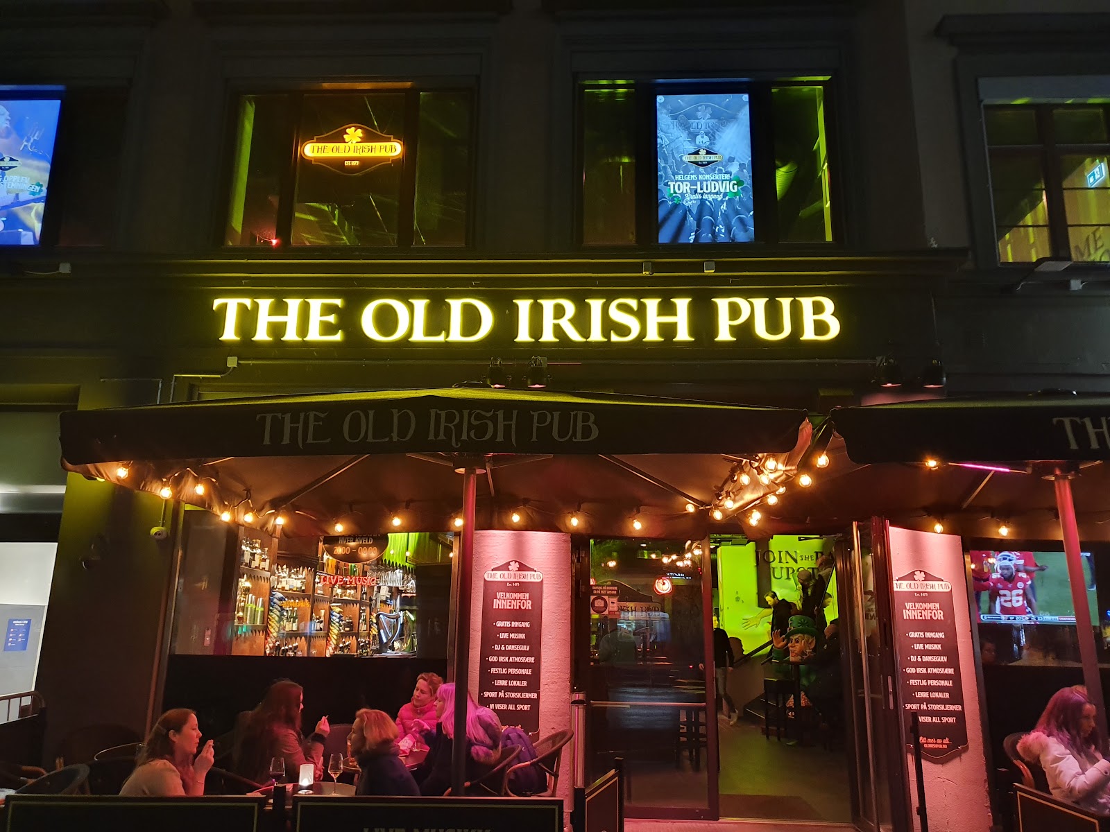 The Old Irish Pub Majorstuen interior with screens and a long bar in Oslo