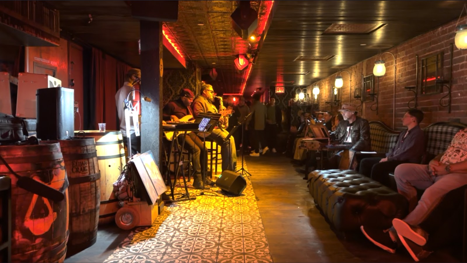 Prohibition speakeasy lounge with vintage decor behind an unmarked door in the Gaslamp Quarter, San Diego