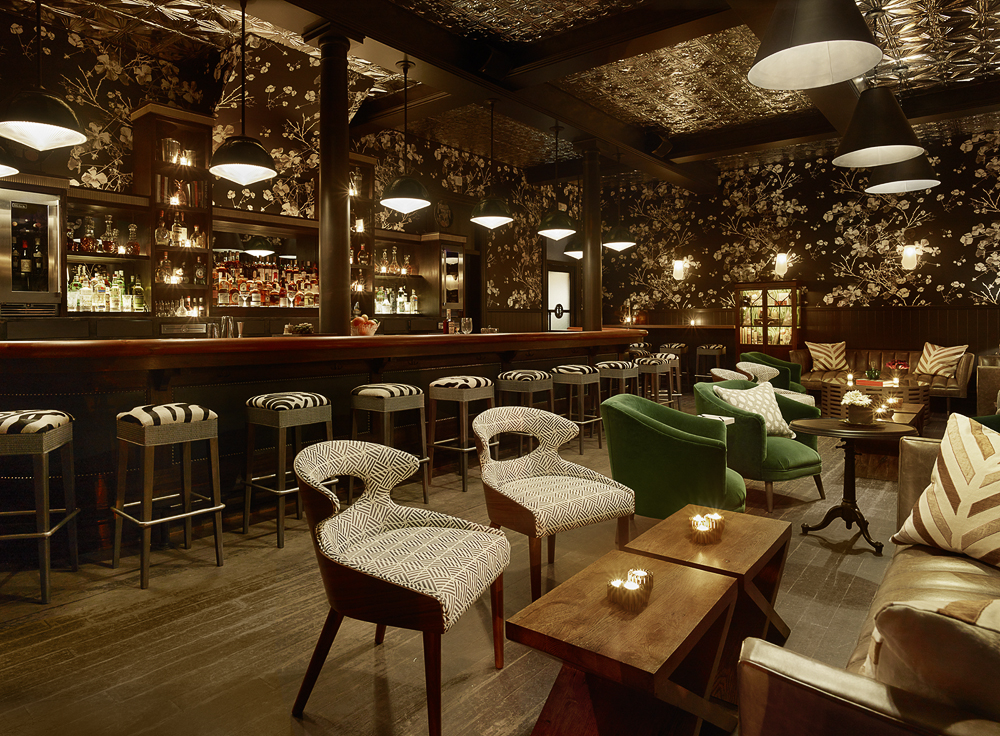 Moody cocktail bar interior with a long bar in San Francisco's Mission District