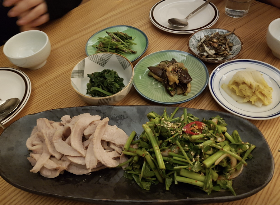A glass of natural wine and Korean small plates at Geumnam Vin