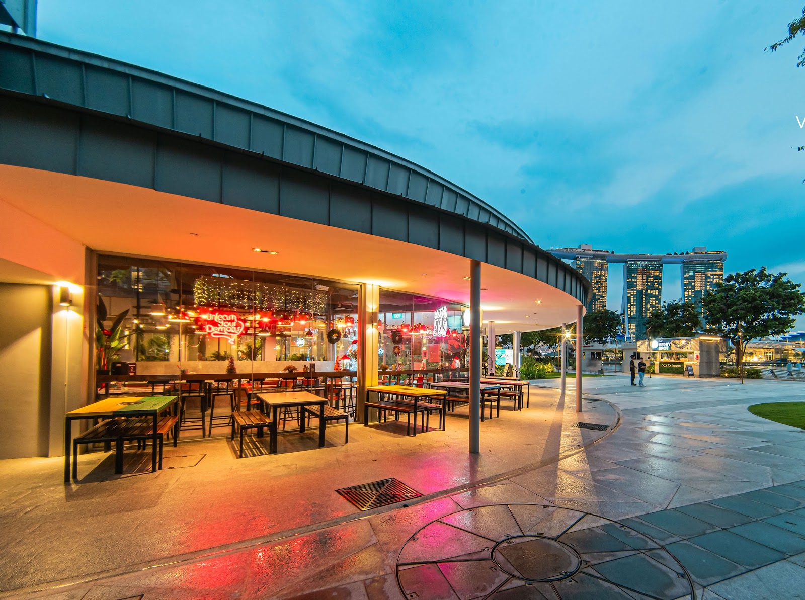 Alter Ego waterfront bar at Esplanade Mall with Marina Bay skyline view, Singapore