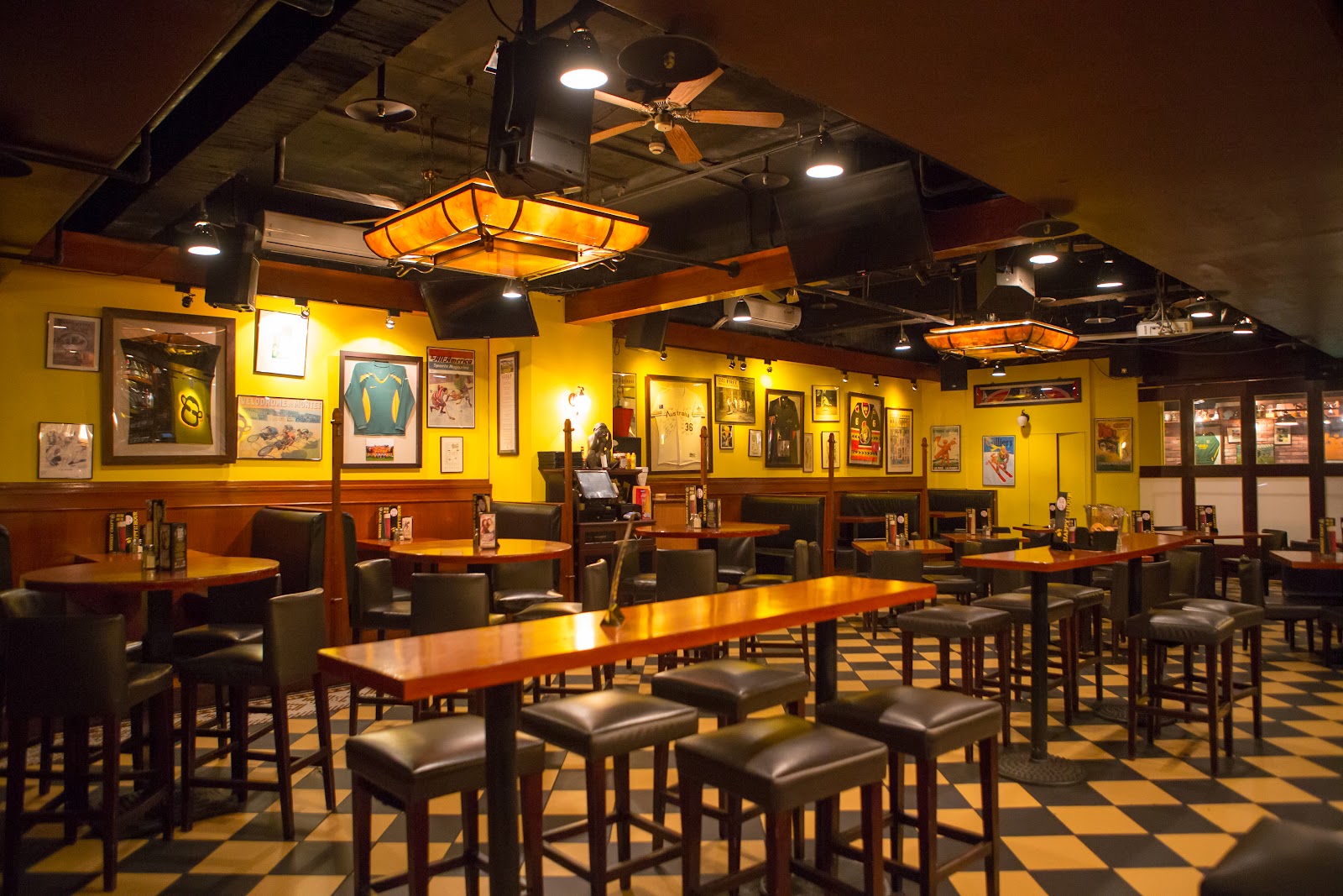 Sports bar interior with screens and long bar, Zhongshan Taipei