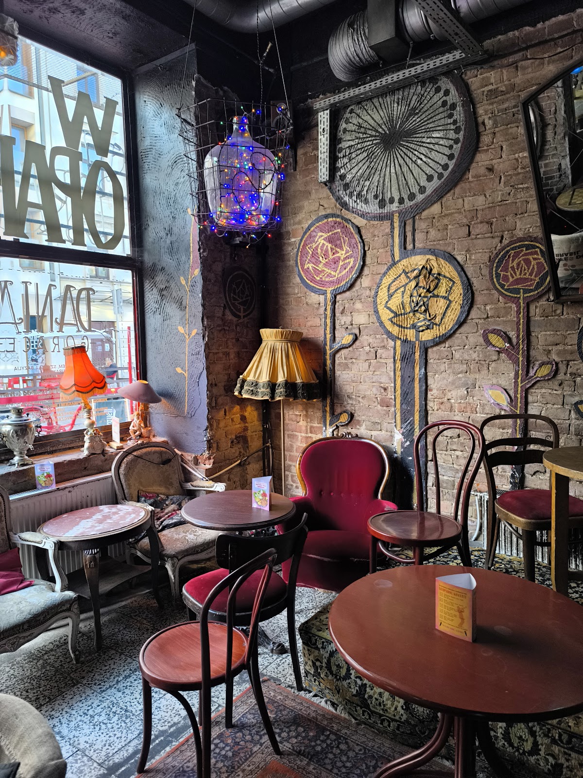 Candlelit antique interior at W Oparach Absurdu, Praga Warsaw